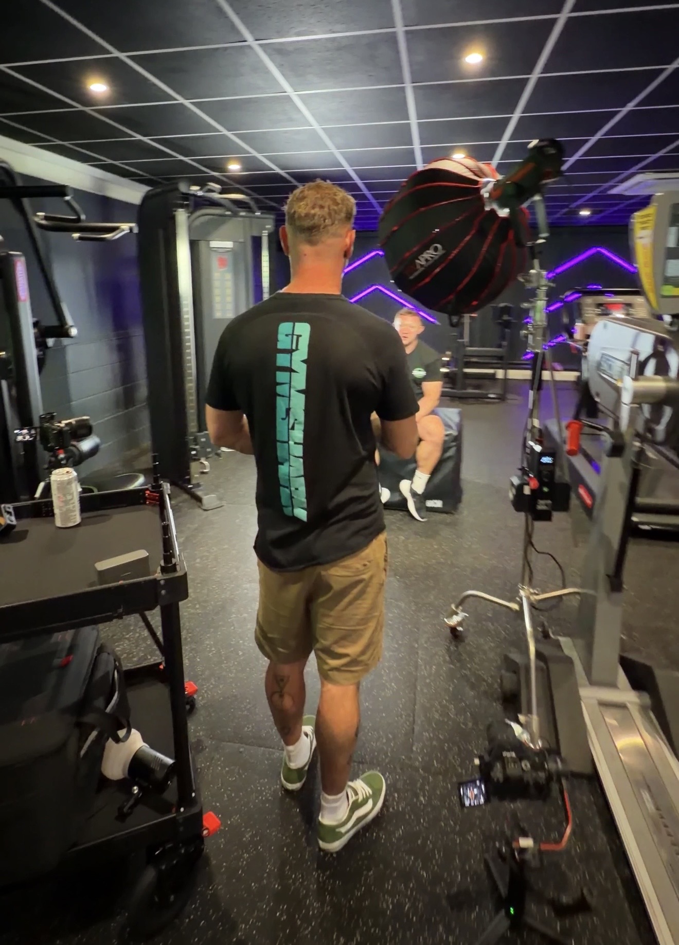 Sean, founder of PMC, on set during a gym interview shoot